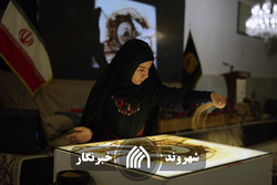 نقاشی فاطمه عبادی در حرم امام رضا