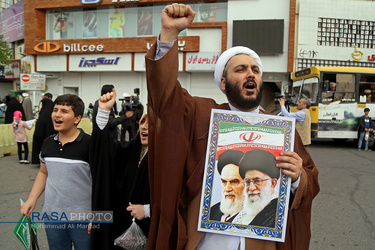 راه پیمایی نمازگزاران جمعه قم در حمایت از سپاه