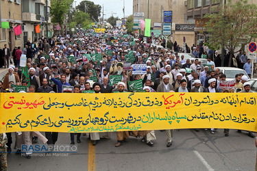 راه پیمایی نمازگزاران جمعه قم در حمایت از سپاه