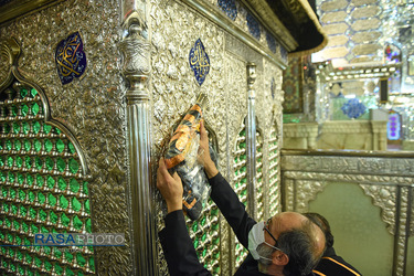 آئین تعویض پرچم حرم حضرت احمد‌بن‌موسی الکاظم (ع) در شراز