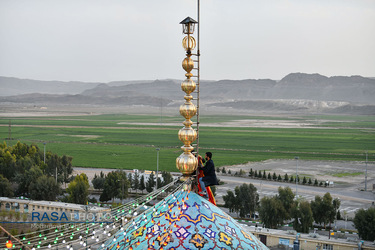 مراسم تعویض پرچم مسجد مقدس جمکران در آستانه نیمه شعبان