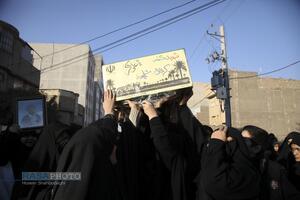 مراسم تدفین پیکر پاک شهید گمنام دفاع مقدس در مدرسه علمیه خواهران حضرت آمنه