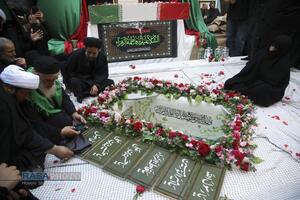 مراسم تدفین پیکر پاک شهید گمنام دفاع مقدس در مدرسه علمیه خواهران حضرت آمنه