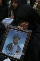 مراسم تدفین پیکر پاک شهید گمنام دفاع مقدس در مدرسه علمیه خواهران حضرت آمنه