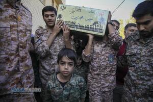مراسم تدفین پیکر دو شهید گمنام دفاع مقدس در بوستان شهید زین الدین قم
