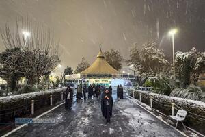 بارش باران و برف در حرم مطهر رضوی