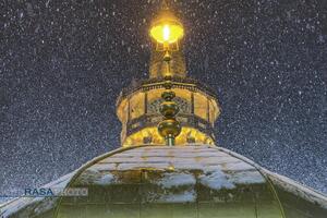 بارش باران و برف در حرم مطهر رضوی