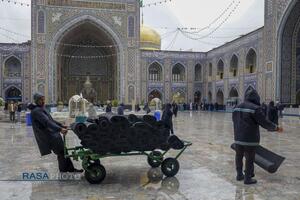 بارش باران و برف در حرم مطهر رضوی