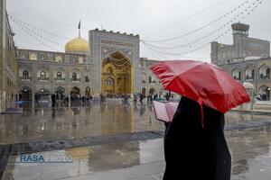 بارش باران و برف در حرم مطهر رضوی