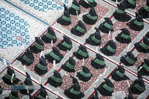 آیین تعویض پرچم گنبد منور رضوی در روز میلاد حضرت امام رضا (علیه‌السلام)