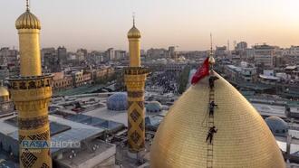 تنظیف گنبد و محیط پیرامونی حرم مطهر حضرت ابالفضل (ع) در آستانه محرم